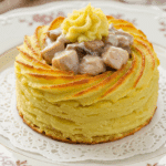 Coquilles de volaille à la crème avec pommes de terre duchesse dorées