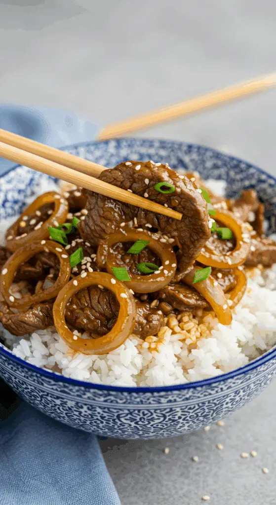 Service boeuf oignons Ronde Interbloc riz bol asiatique baguettes graines sésame