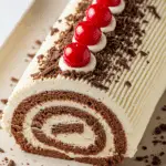 Bûche mascarpone chocolat crémeuse décoration copeaux élégante festive