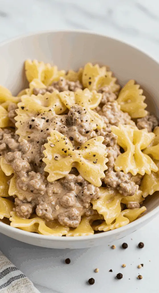 Pâtes papillon viande hachée sauce crémeuse onctueuse réconfortante