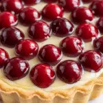 Tarte cheesecake cerises crémeuse fraîche amandes estivale élégante