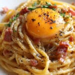 Spaghettis carbonara œuf coulant crémeux authentique romain irrésistible